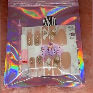 Elegant Nude Press-On Nails with Gold Accents